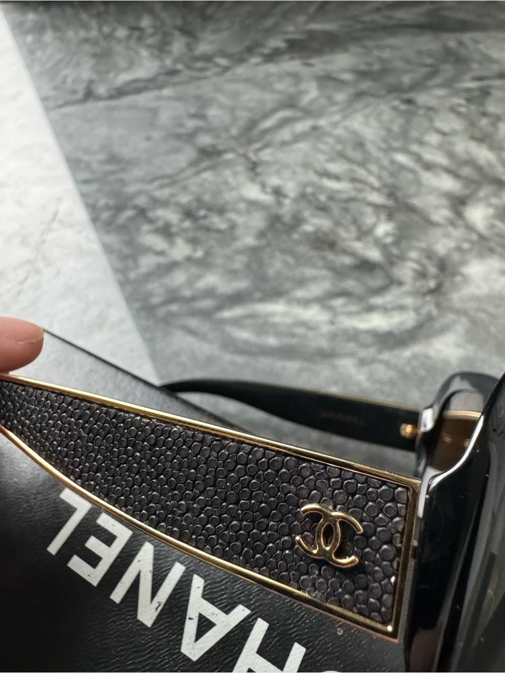 CHANEL Black Sunglasses with Gold Logo Accent